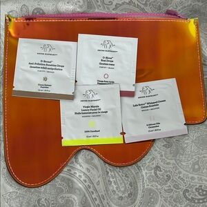 Drunk Elephant Skincare Sample Set with Orange Ombre Pouch